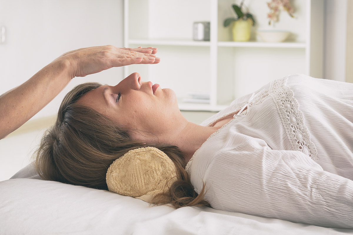 Professional Reiki healer doing reiki Reiki