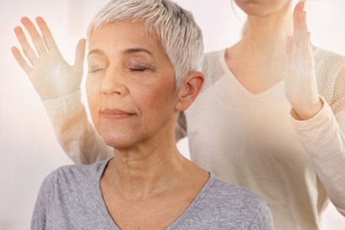 Professional Reiki healer doing reiki Hypnotic Reiki